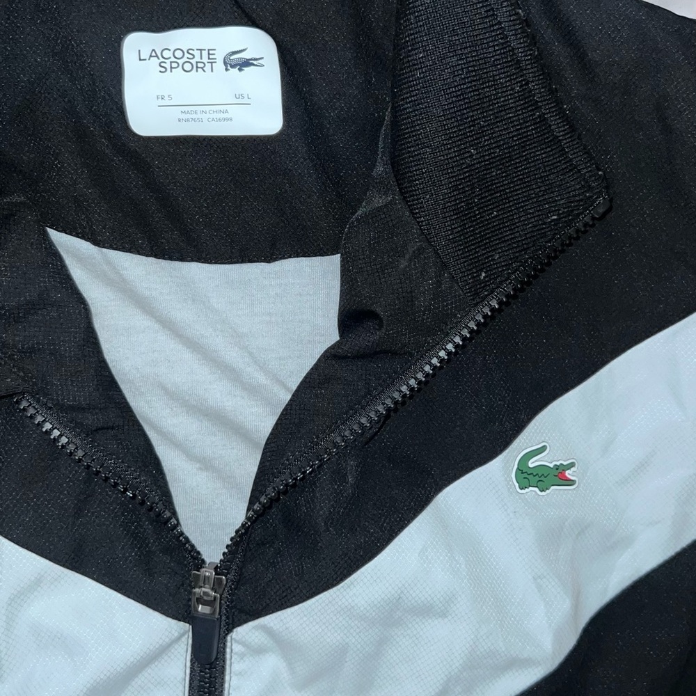 Lacoste Black and White Windbreaker with Chevron Design - Picture 8 of 10
